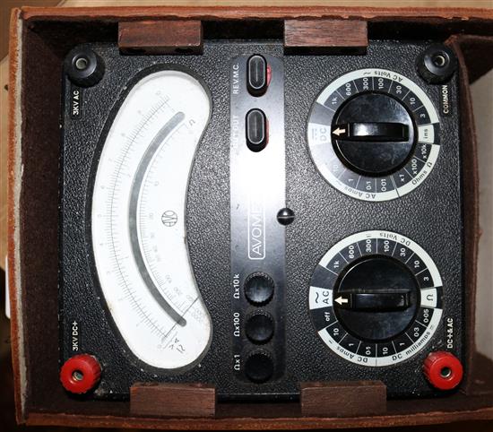 2 leather cased meters